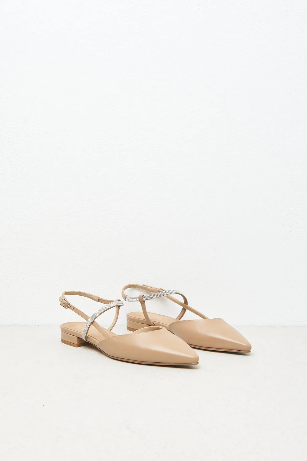 Flat leather slingback pumps with Punto Luce